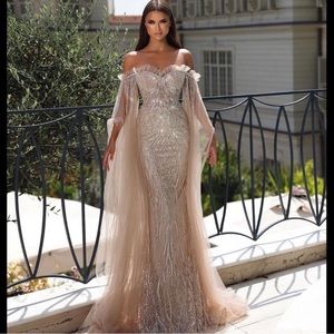 Catwalk couture gown brand new never worn.